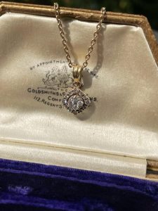Here’s the product description for the Vintage Diamond Encrusted Gold Charm: Vintage Diamond Encrusted Gold Charm